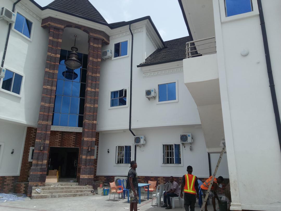 Jardex Paint site photography of a finished building exterior in Calabar